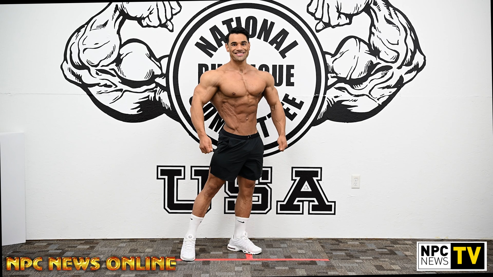 2024 IFBB Pittsburgh Pro Men's Physique Champion Ali Bilal Posing